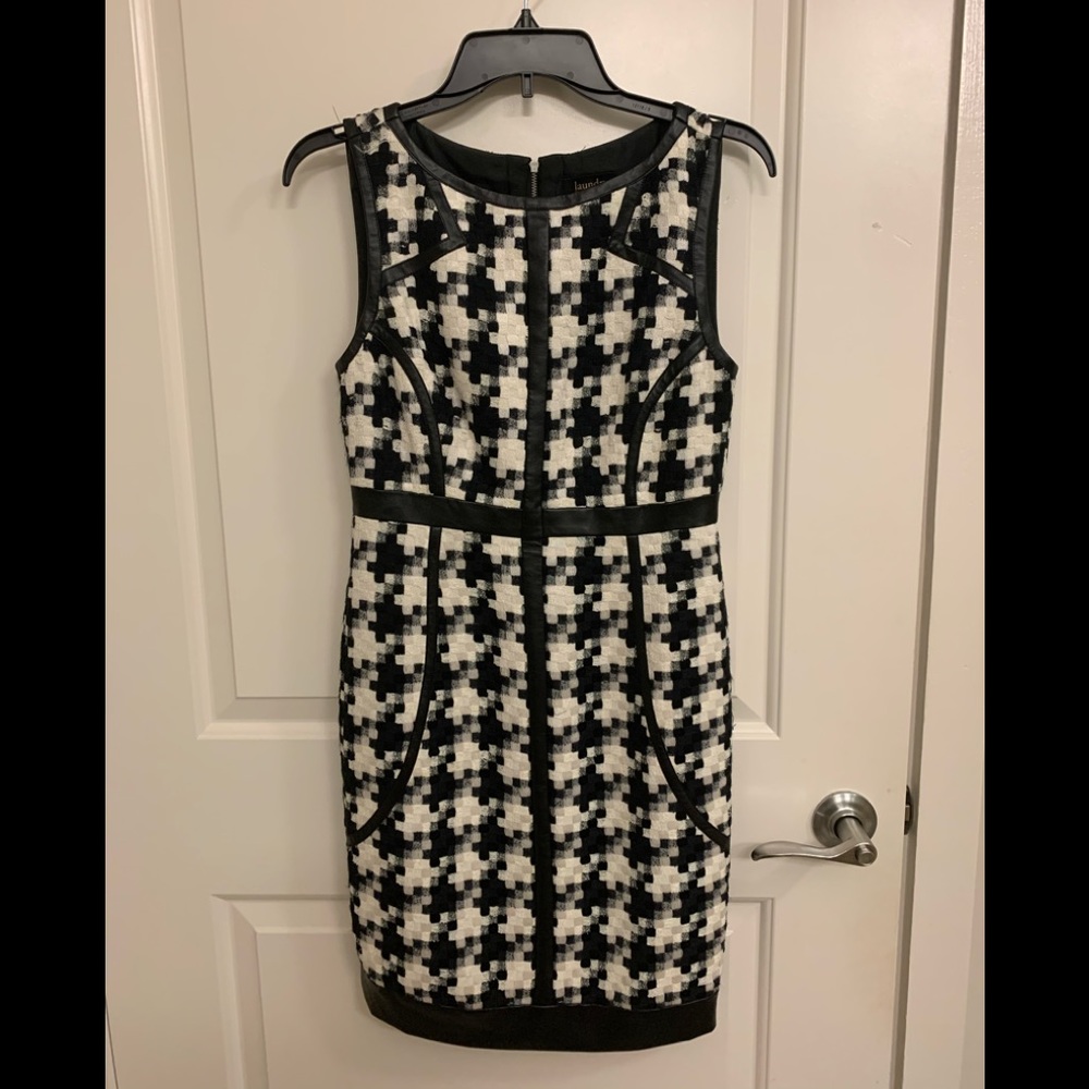 Laundry tweed dress with leather trim.